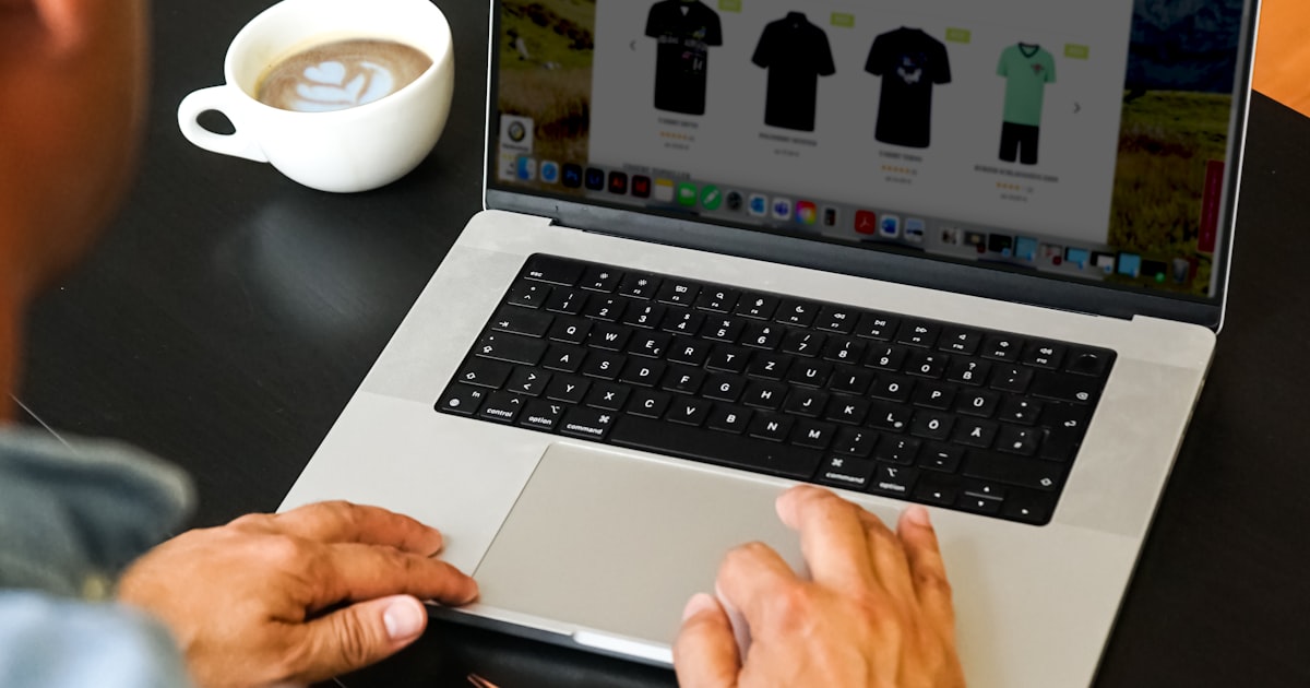 Writer crafting authentic content at a laptop, the type of first-hand expertise Google's 2026 Authenticity Update rewards over generic AI-generated summaries